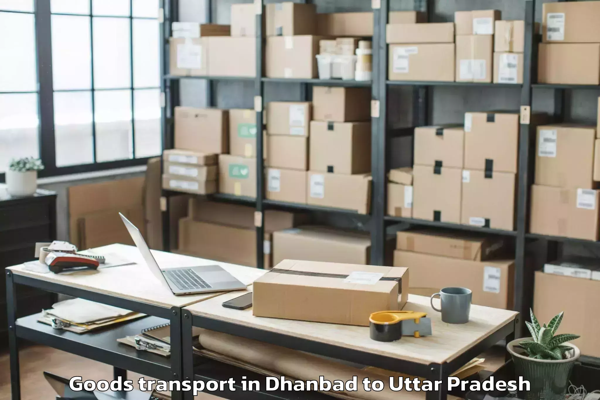 Get Dhanbad to Maghar Goods Transport